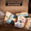 confezione sottovuoto di Parmigiano Reggiano Prodotto di Montagna